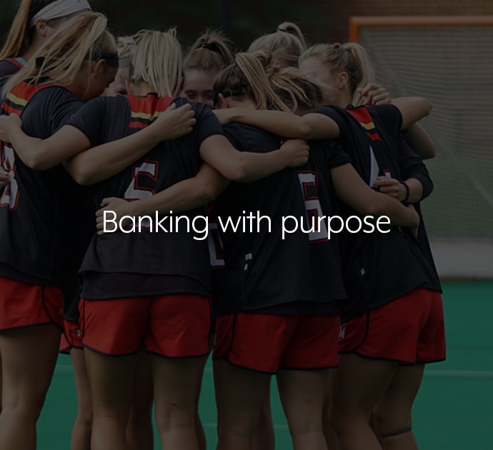 Graphic of a typography specimen showing the alphabet and numerals on top of a dark gray background.